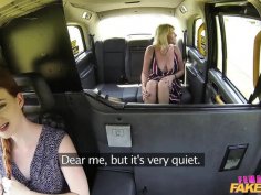 Big tits redhead and blonde milf eat pussy in fake taxi