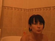 Amateur brunette girlfriend masturbating and sucking cock in the bathroom